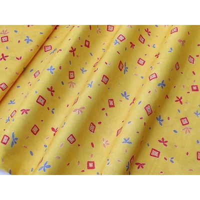Sárga alapon kék és pink mintás dekor