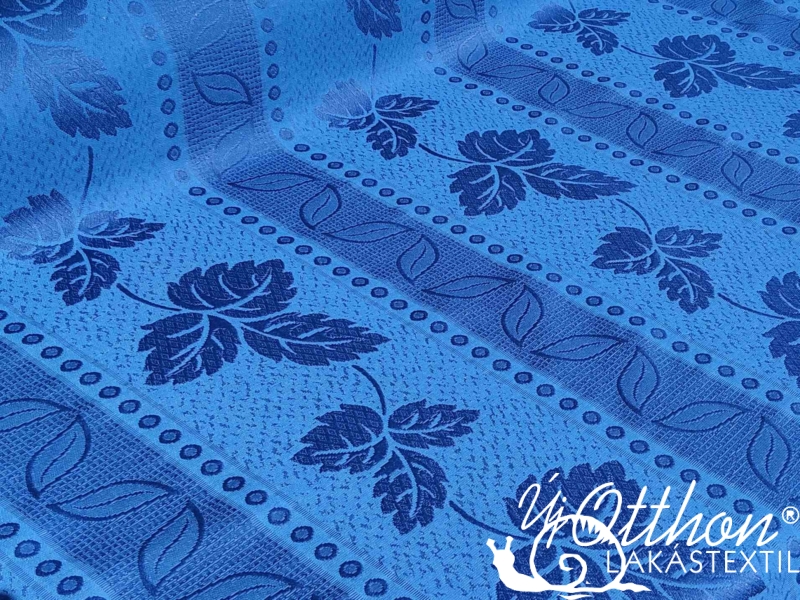 Piquet Estelia kék színű csíkos leveles szőtt ágytakaró anyag 